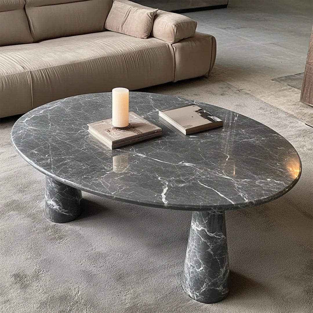 oval marble coffee table with cylindrical legs